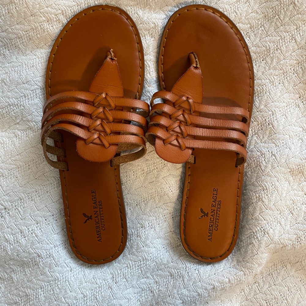 American eagle tan flip flops